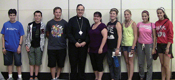 President Bugbee poses with NALC participants at the National Youth Gathering.