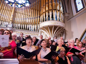 The choir sings from the loft.