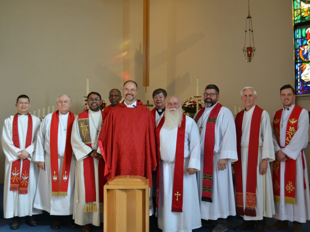 Group shot of pastors at the installation of Rev. Guntar Baikovs.
