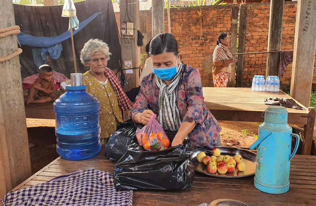 Woman packaging food.